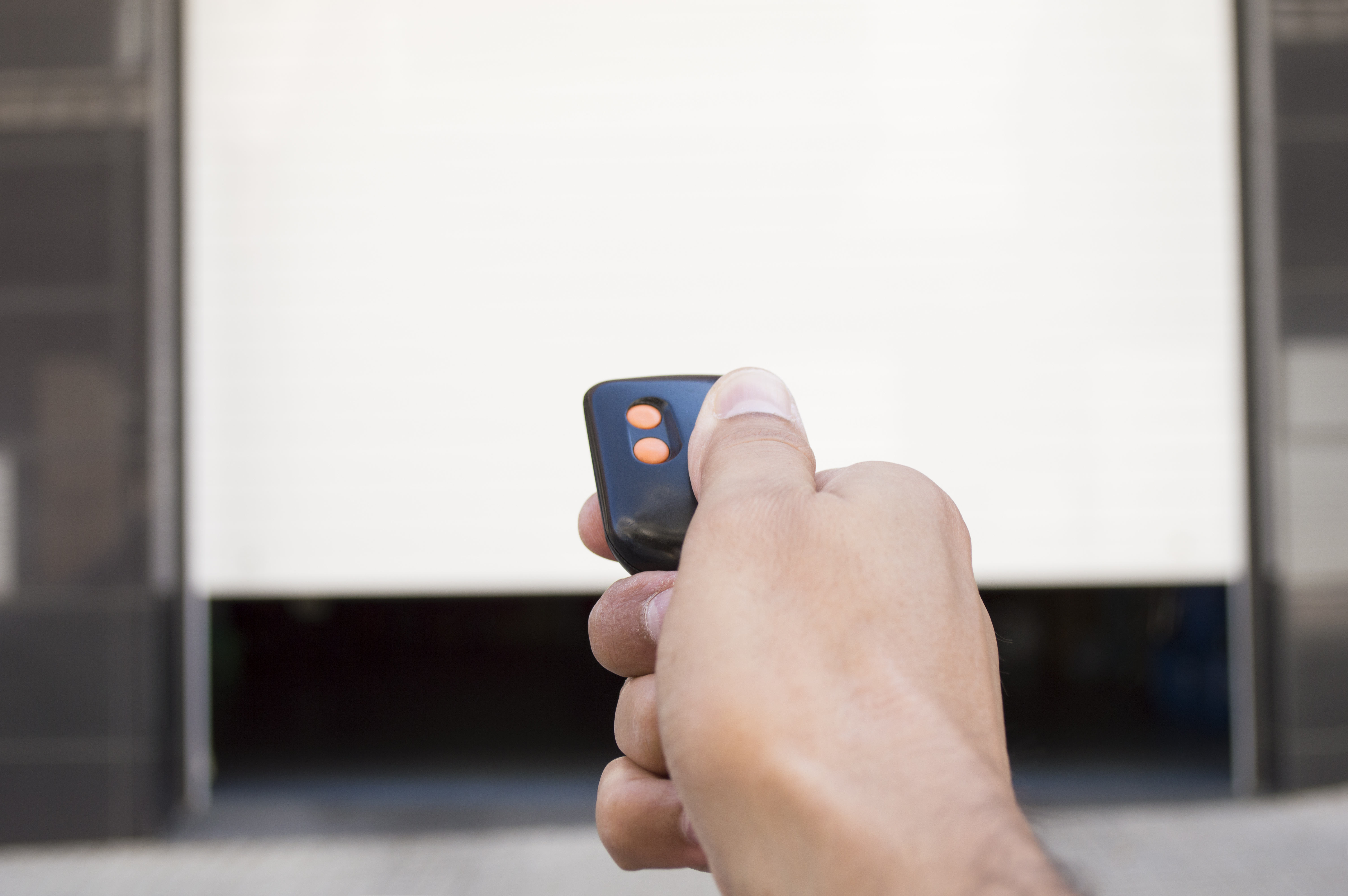 Top Reasons A Garage Door Won T Open Ponderosaponderosa Opening A Garage Door With Remote Dead Transmitter Batteries